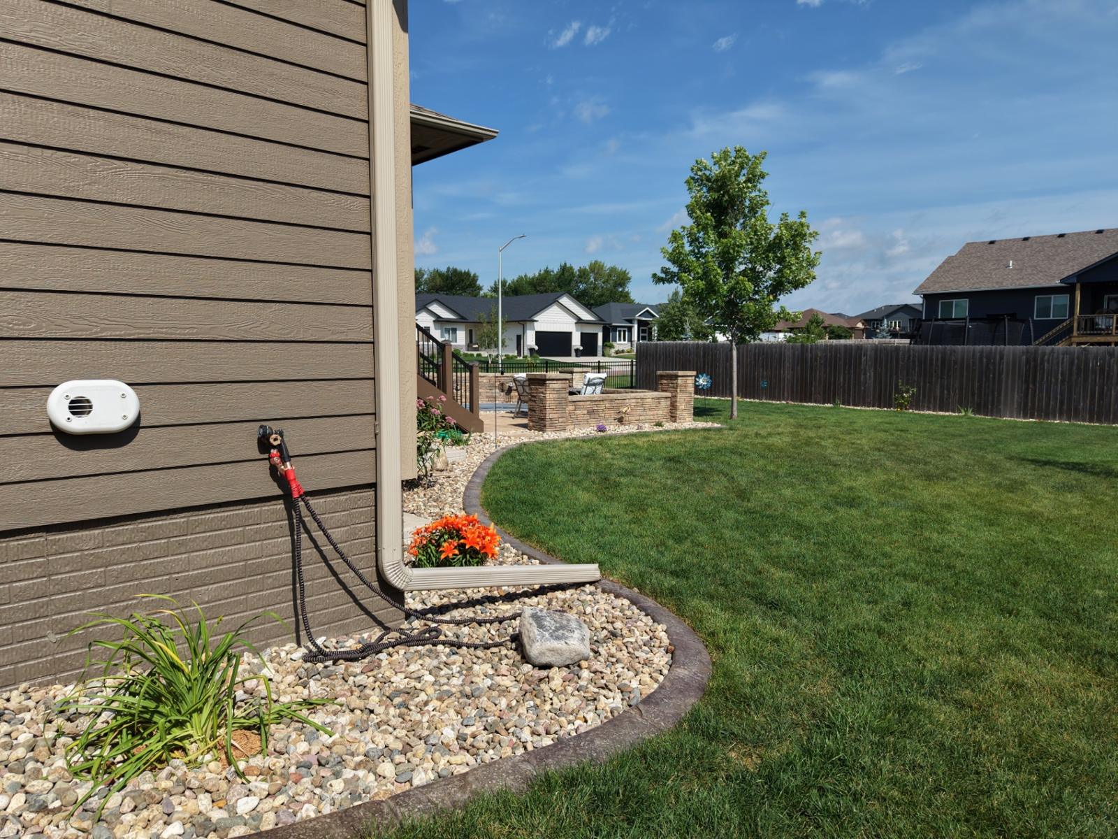 Freshly edged and cleaned side yard by Kerwin