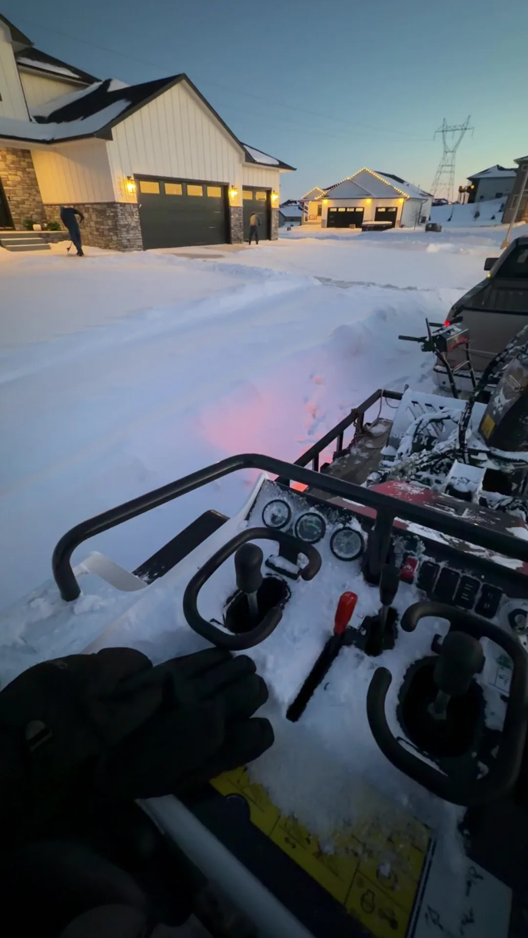 Sioux Falls driveway cleared of snow after a South Dakota winter storm by Kerwin snow removal crew